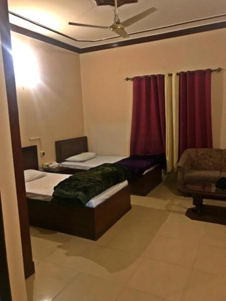 Babar House Hotel Faisalabad Exterior foto